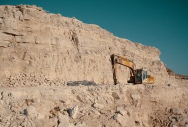 Heavy machinery in quarry. Building materials mining